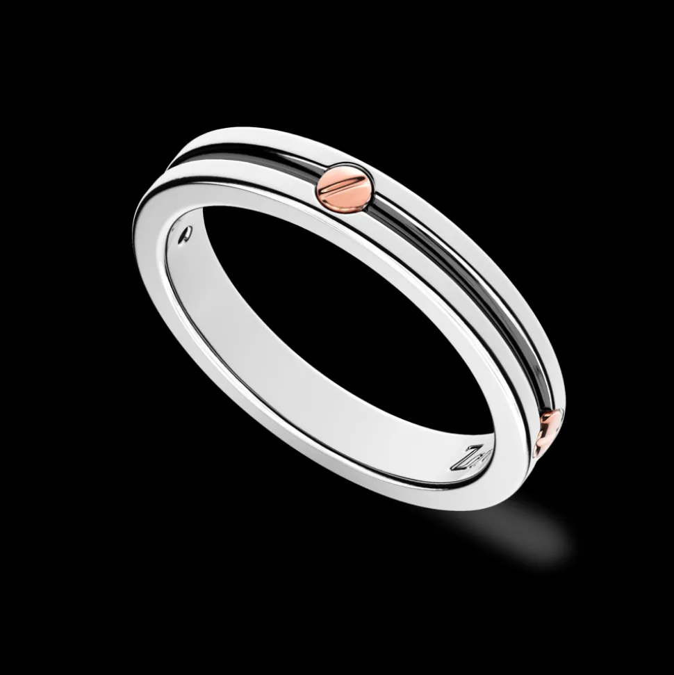 Anello a fede Zancan in argento con vite in oro rosa.
