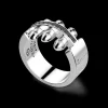 Anello Zancan in argento a proiettili con pietre nere.
