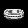 Anello Zancan in argento a fede con pietre nere.