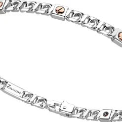Bracciale a grumetta Zancan in argento con viti in oro rosa.