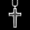 Collana Zancan in argento con pendente a croce e pietre nere.