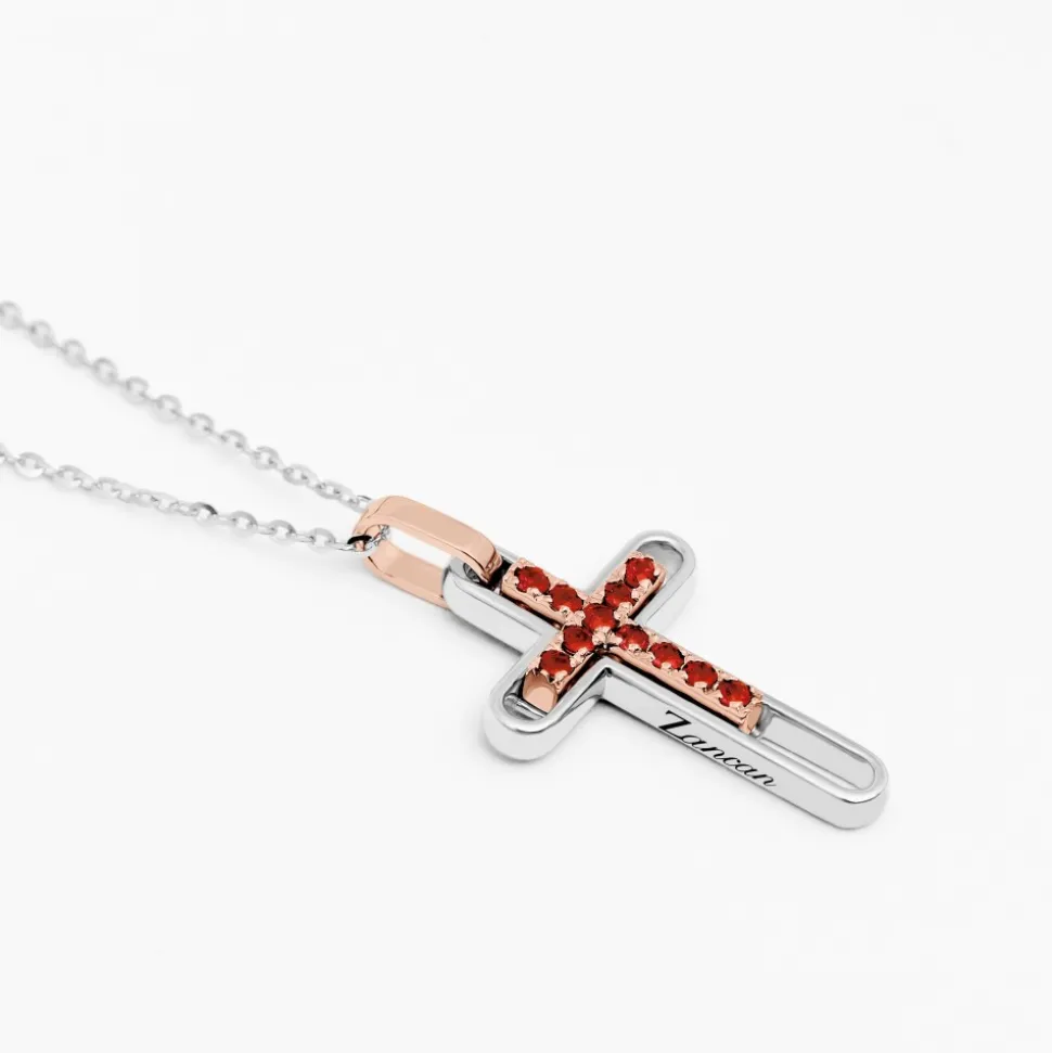 Collana zancan in oro con croce e rubini.