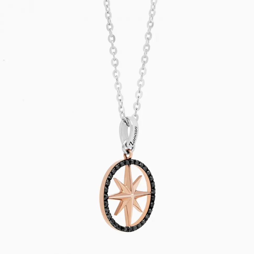 Collana zancan in oro con pendente rosa dei venti e diamanti.