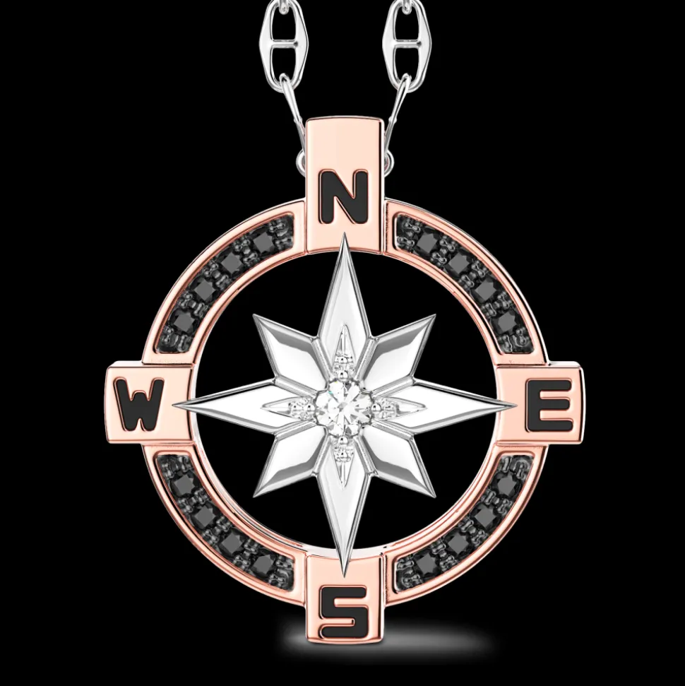 Collana zancan in oro con pendente rosa dei venti e diamanti.