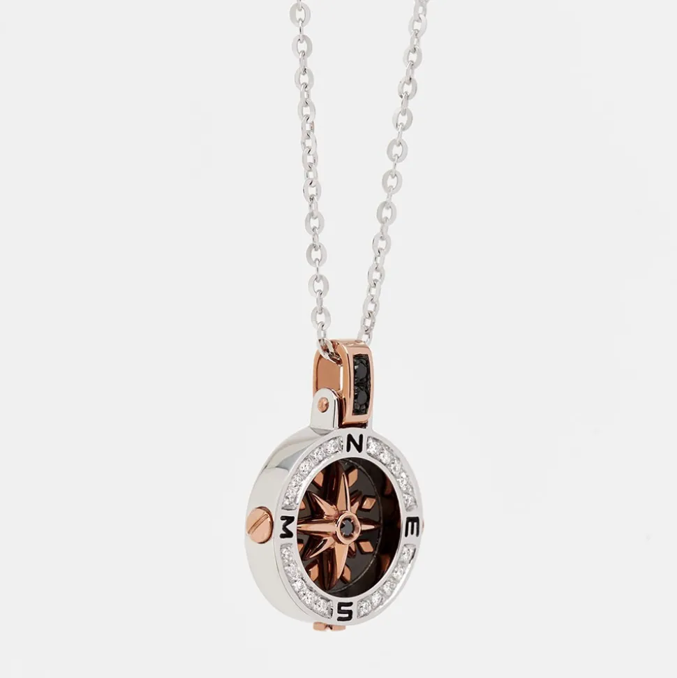 Collana zancan in oro con pendente rosa dei venti e diamanti.