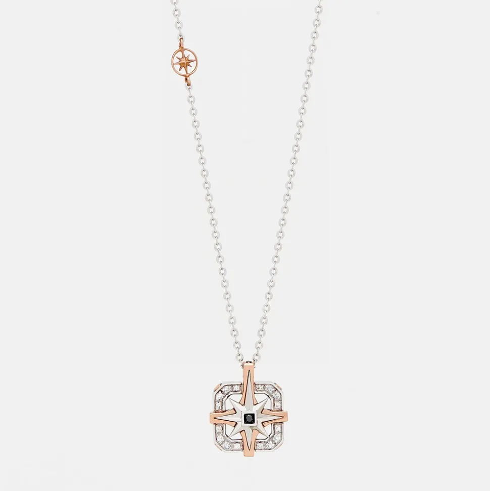 Collana zancan in oro con pendente rosa dei venti e diamanti.