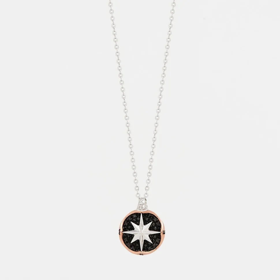 Collana zancan in oro con pendente rosa dei venti e diamanti.