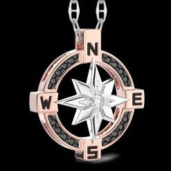 Collana  zancan in oro con pendente rosa dei venti e diamanti.
