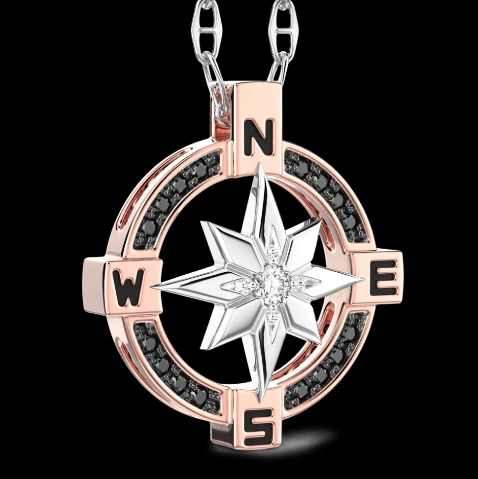 Collana zancan in oro con pendente rosa dei venti e diamanti.